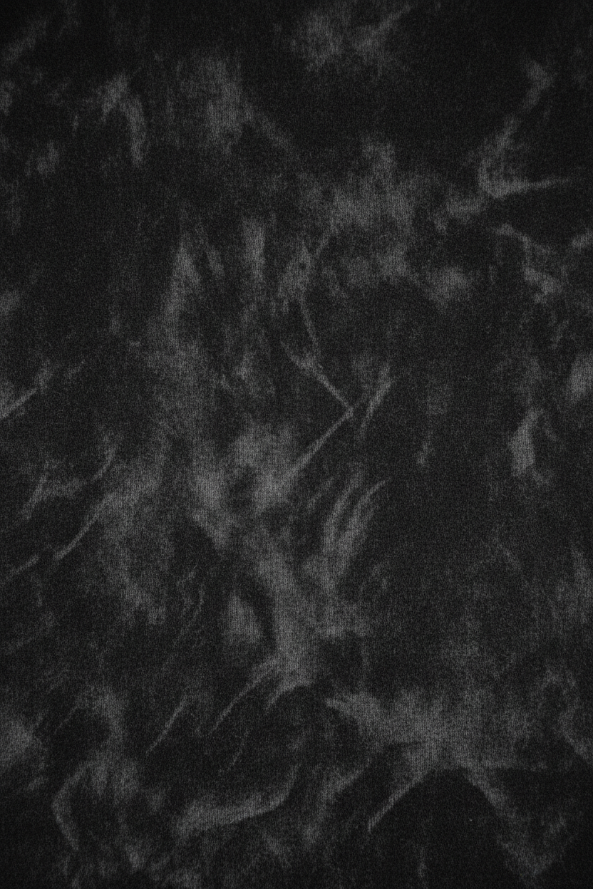 Close-up of 400gsm garment-dyed loop-back fleece in washed black — echelonn. HQ 001