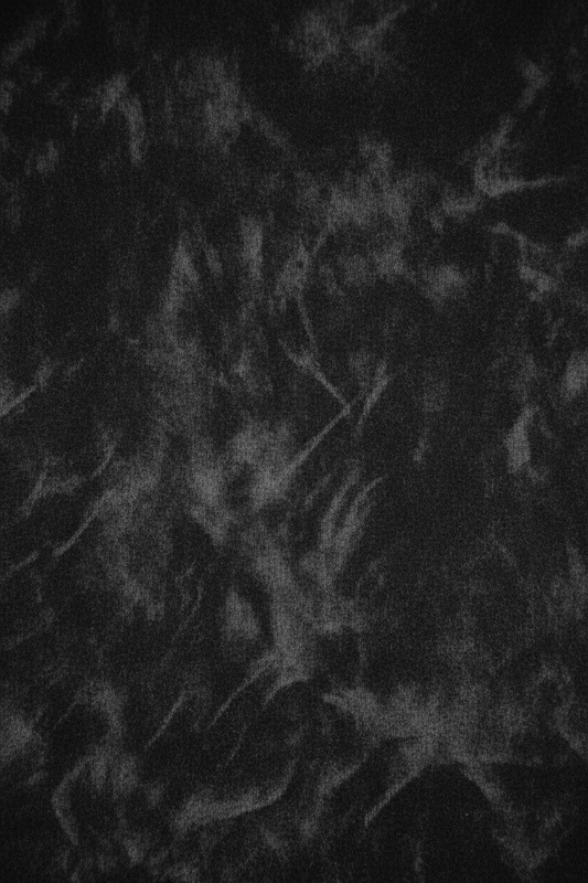 Close-up of 400gsm garment-dyed loop-back fleece in washed black — echelonn. HQ 001