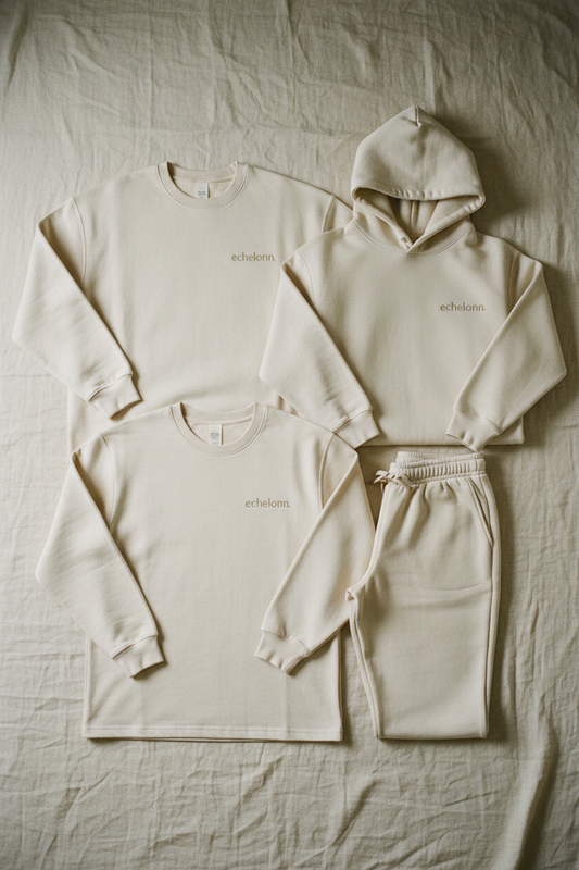 echelonn. HQ 001 full formation flat lay in stone — thorax. sweatshirt, peplos. tee, aegis. hoodie, podea. joggers, 400gsm ring-spun cotton